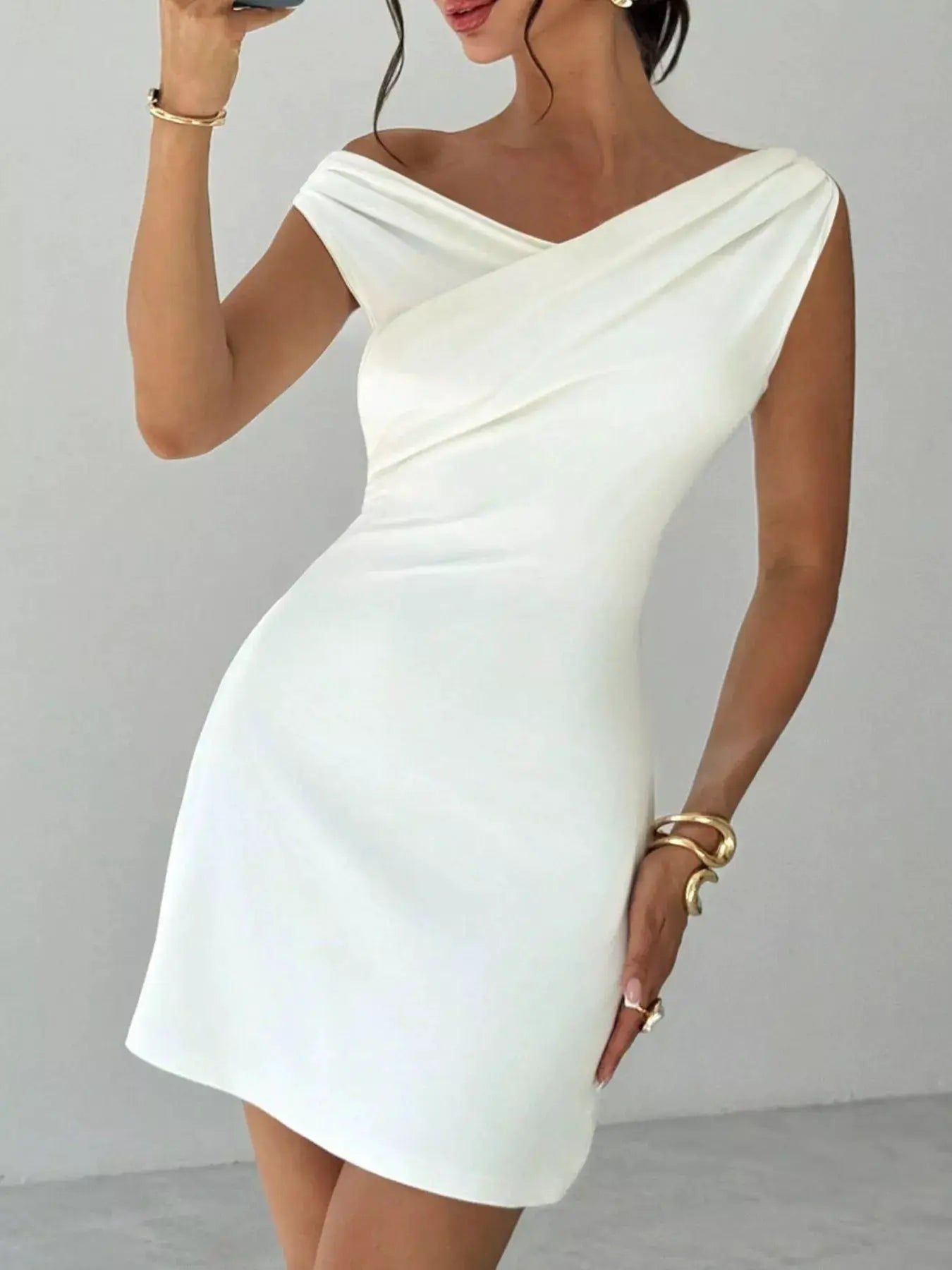 Elegant Off-Shoulder Draped Mini Dress by Trendsi