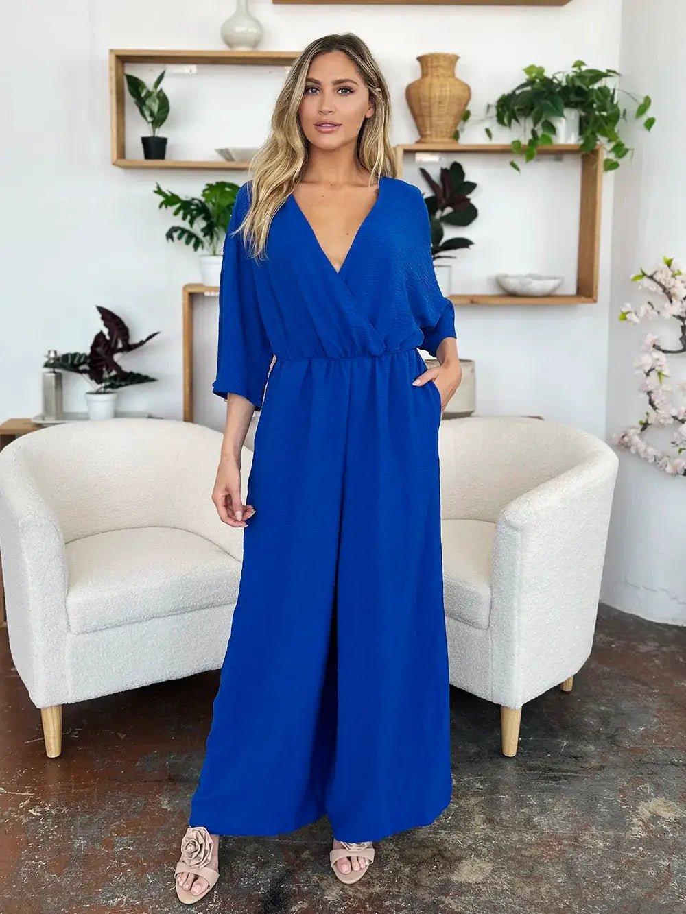 Double Take Surplice Wide Leg Jumpsuit With Pockets Full Size - Fritsch & Co.