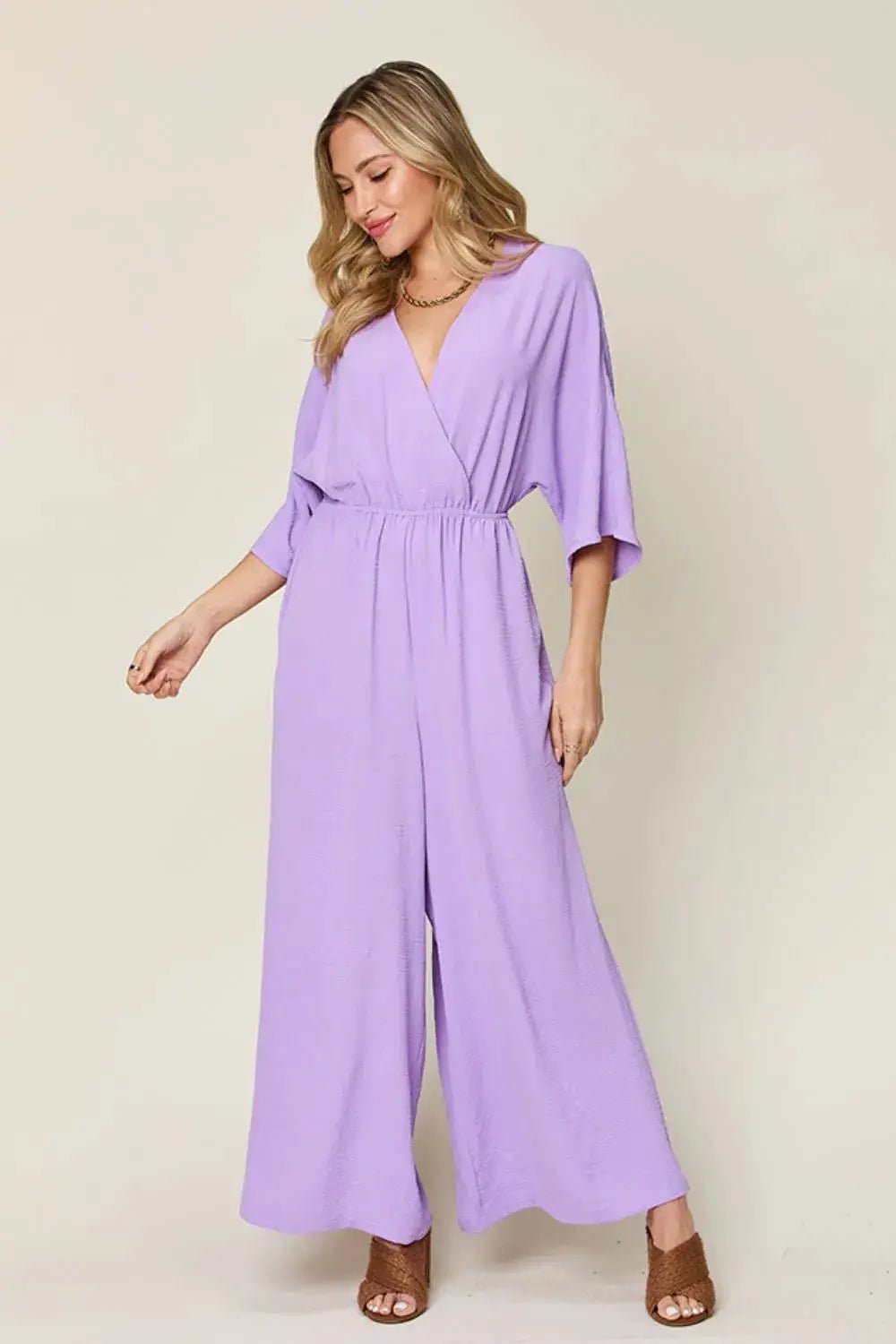 Double Take Surplice Wide Leg Jumpsuit With Pockets Full Size - Fritsch & Co.