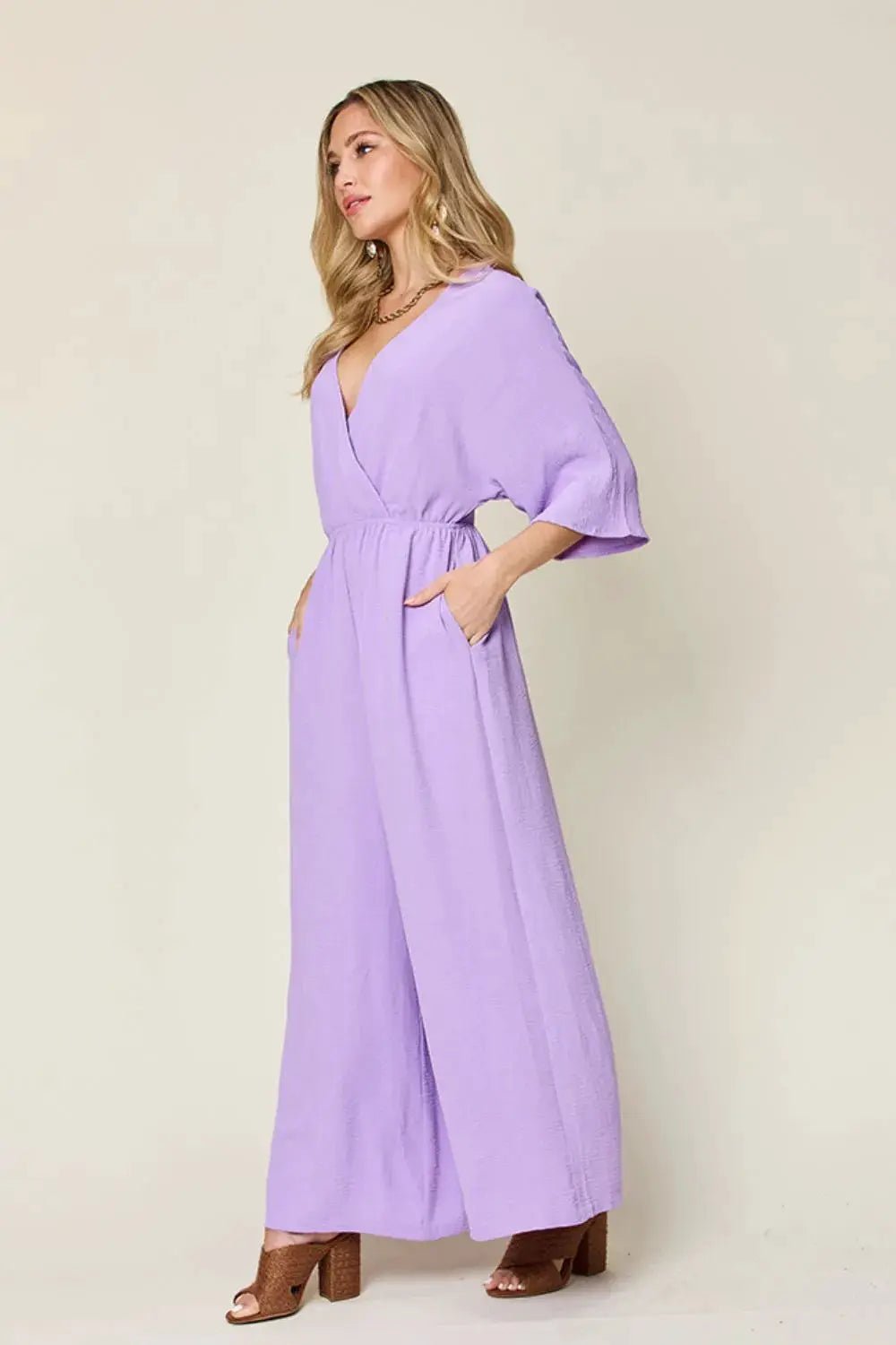 Double Take Surplice Wide Leg Jumpsuit With Pockets Full Size - Fritsch & Co.
