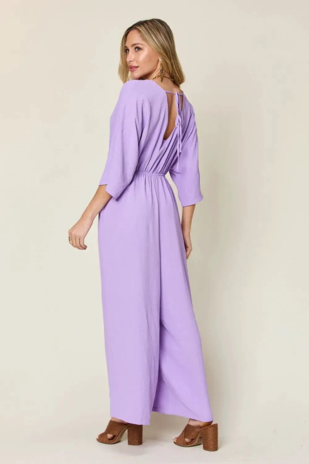 Double Take Surplice Wide Leg Jumpsuit With Pockets Full Size - Fritsch & Co.
