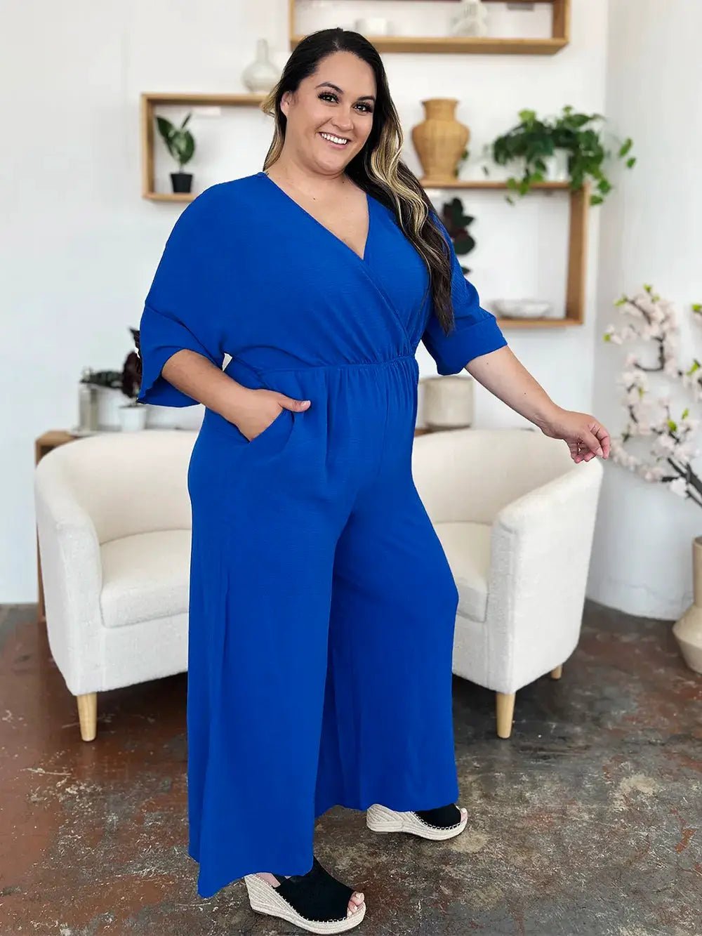Double Take Surplice Wide Leg Jumpsuit With Pockets Full Size - Fritsch & Co.