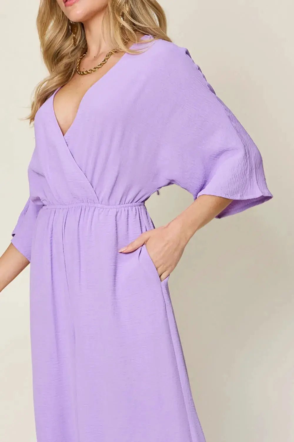 Double Take Surplice Wide Leg Jumpsuit With Pockets Full Size - Fritsch & Co.