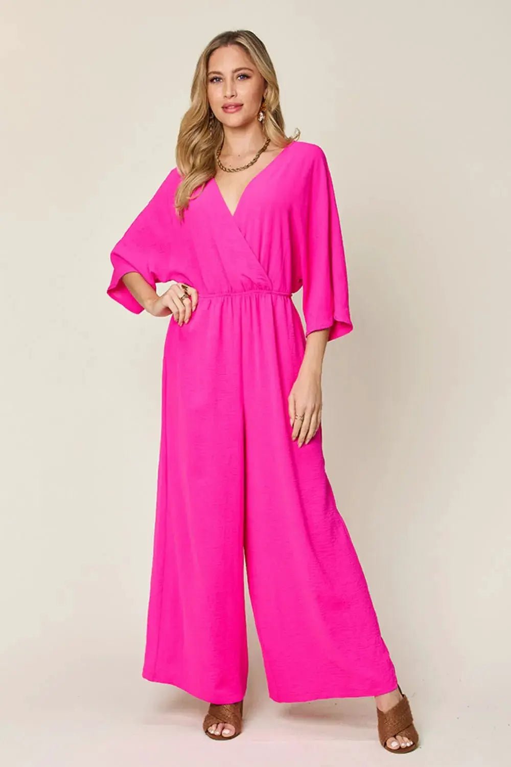 Double Take Surplice Wide Leg Jumpsuit With Pockets Full Size - Fritsch & Co.