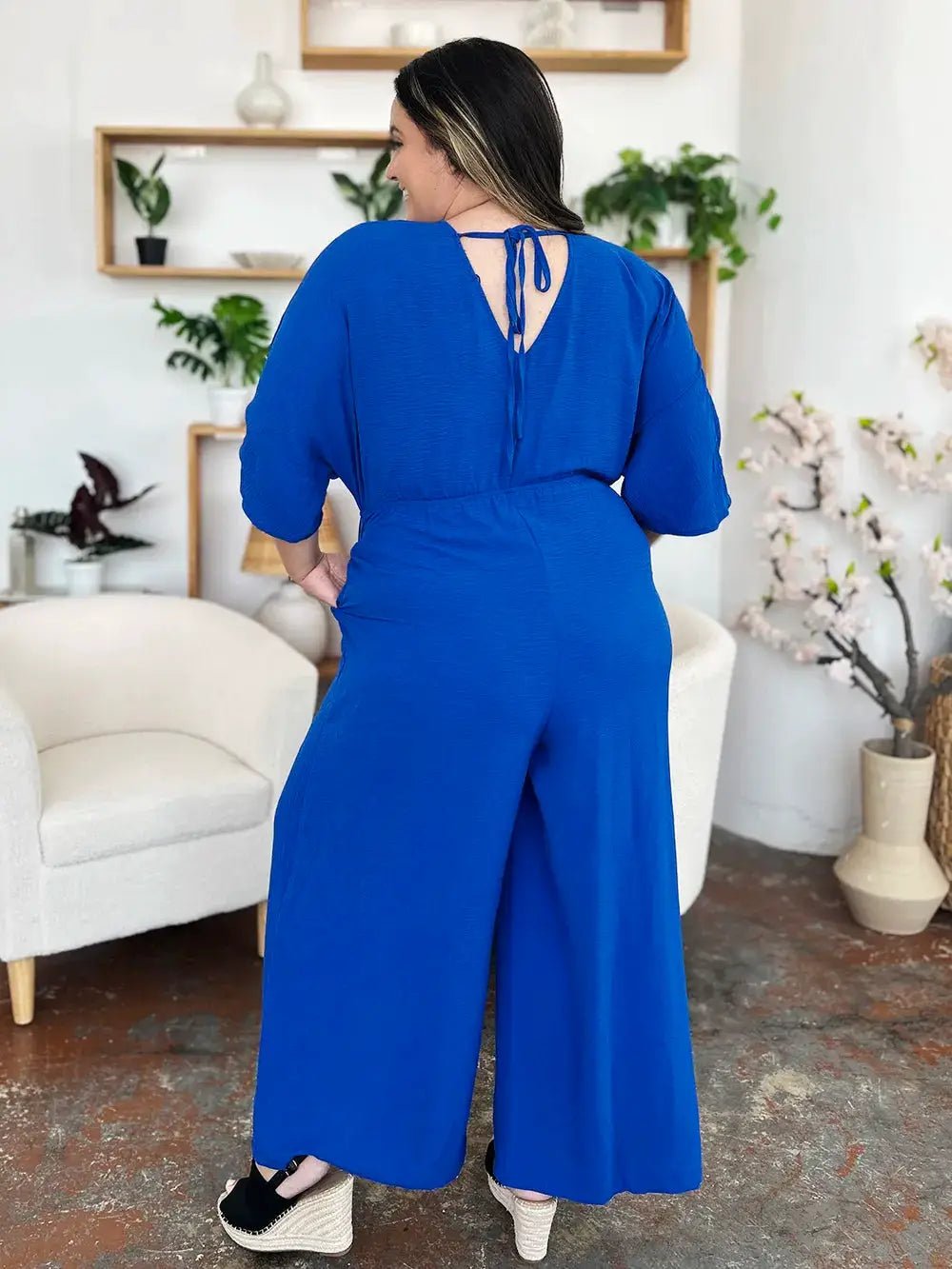 Double Take Surplice Wide Leg Jumpsuit With Pockets Full Size - Fritsch & Co.