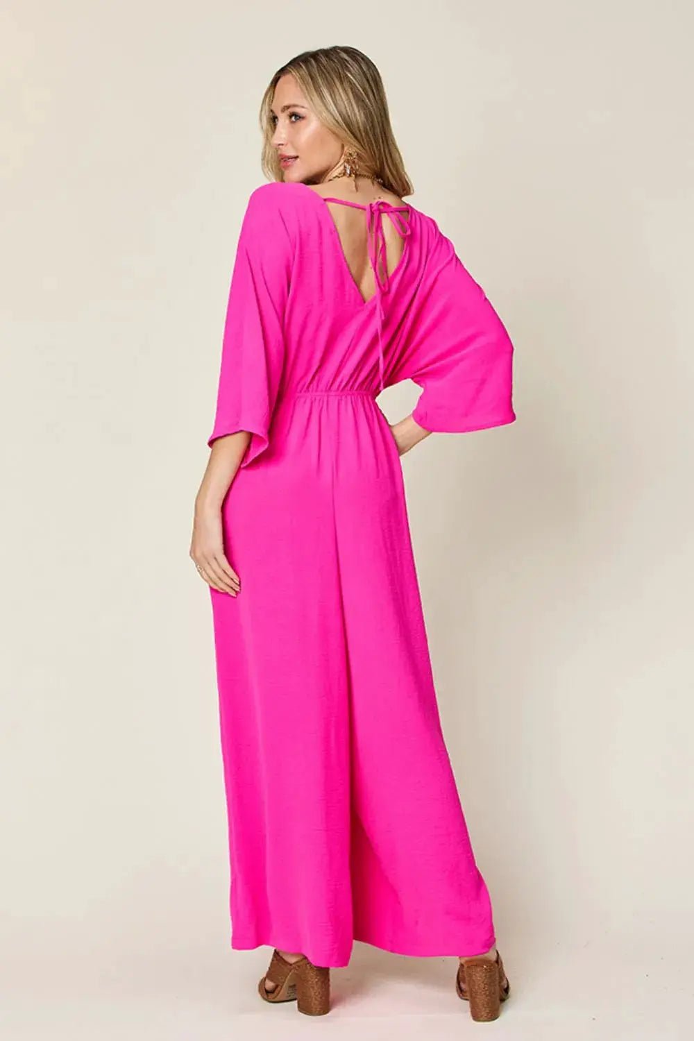 Double Take Surplice Wide Leg Jumpsuit With Pockets Full Size - Fritsch & Co.