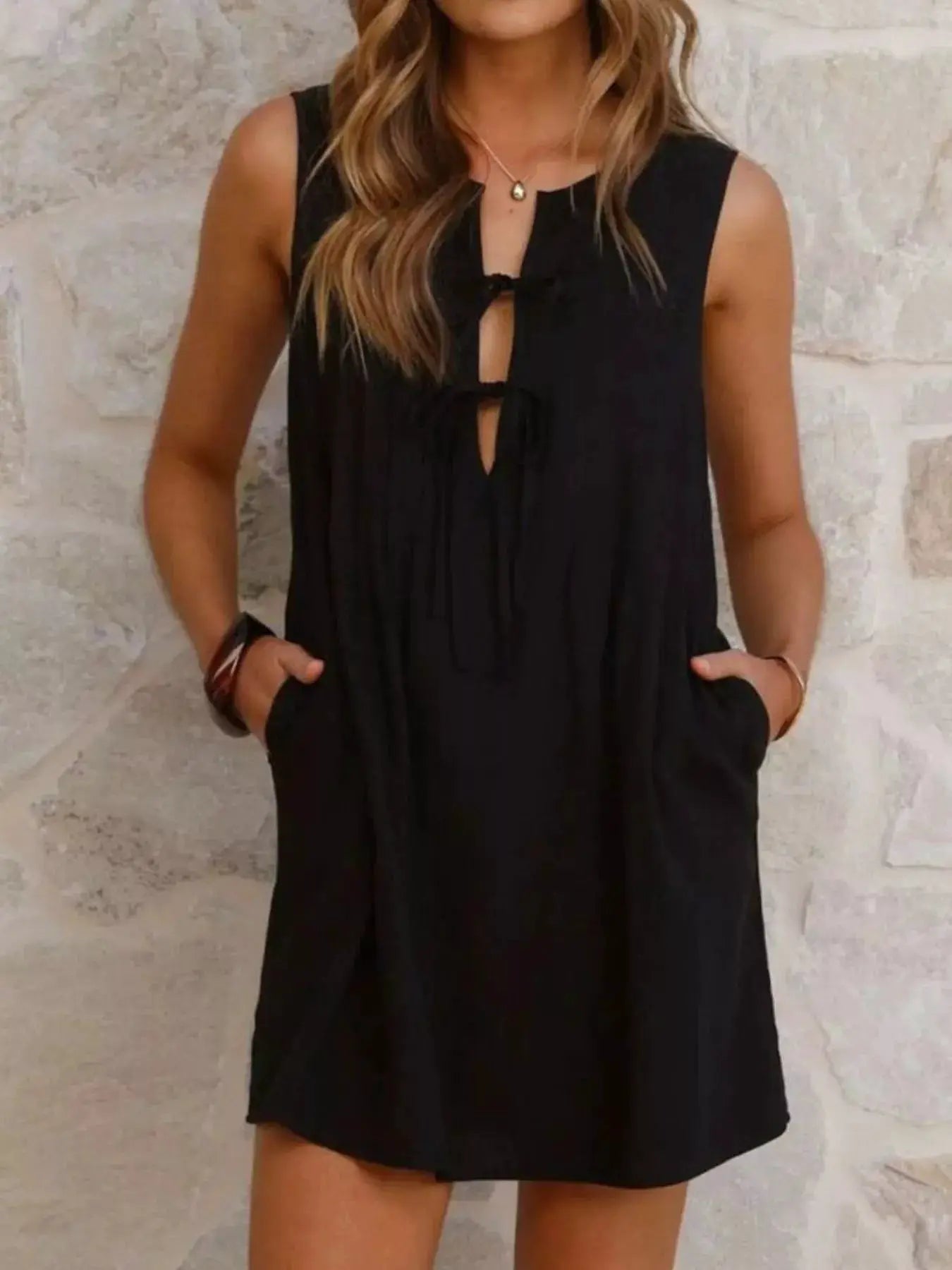 Sleeveless Tie Front Mini Dress With Ruched Detailing - Fritsch & Co.