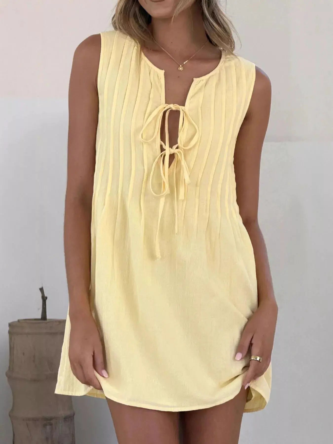 Sleeveless Tie Front Mini Dress With Ruched Detailing - Fritsch & Co.