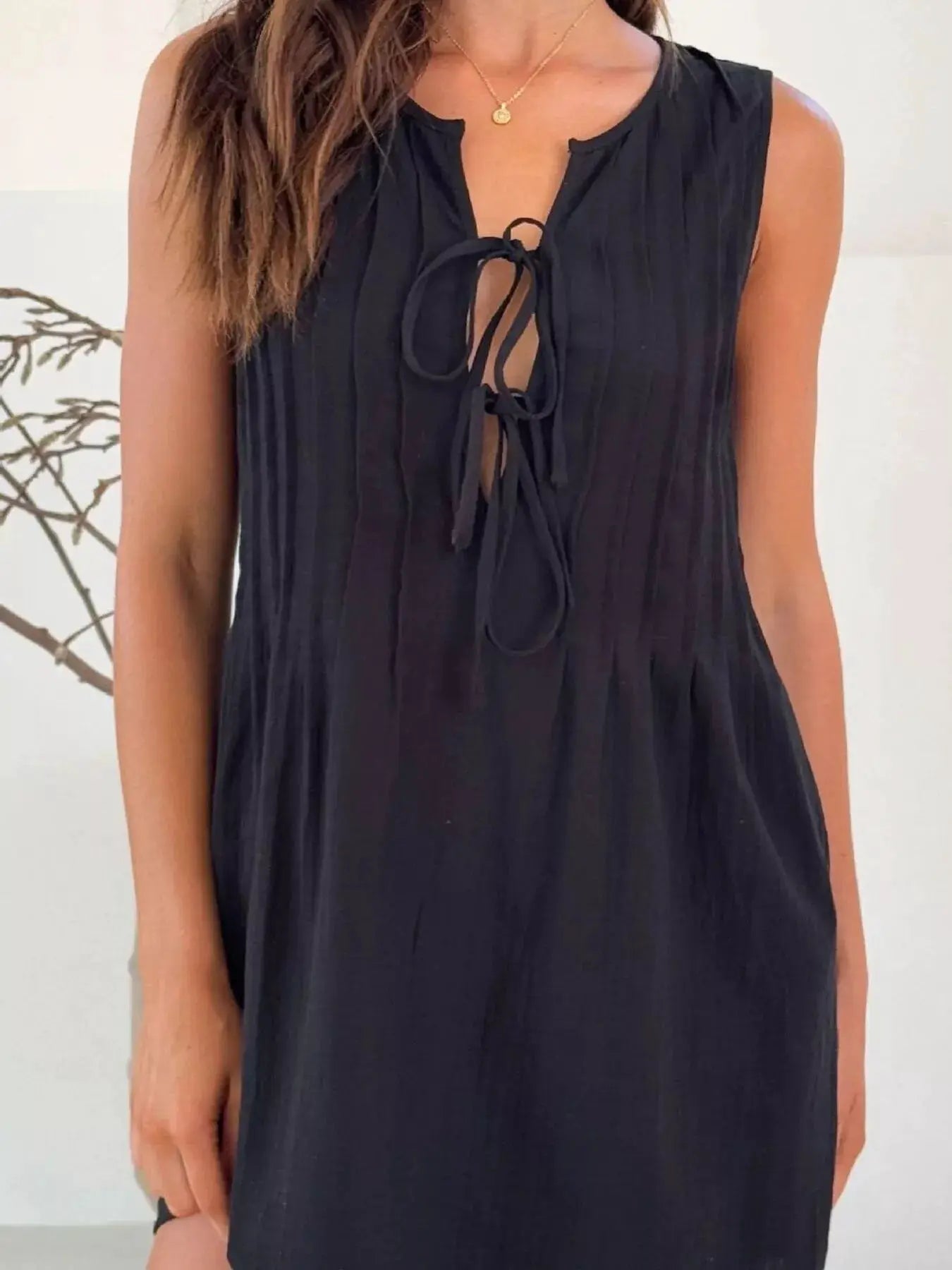 Sleeveless Tie Front Mini Dress With Ruched Detailing - Fritsch & Co.