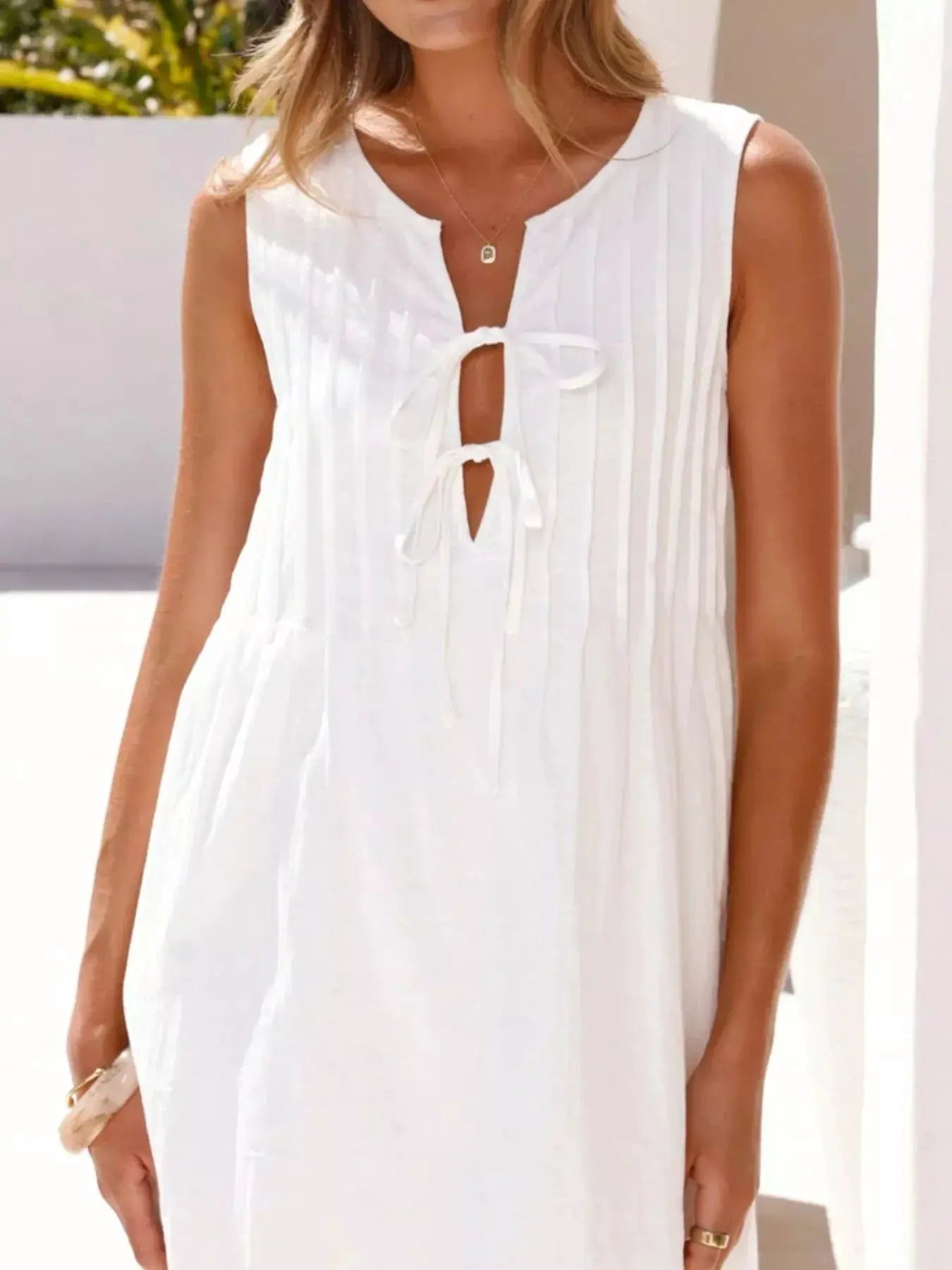 Sleeveless Tie Front Mini Dress With Ruched Detailing - Fritsch & Co.